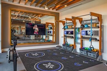 Barre, yoga, and trx studio with fitness on demand